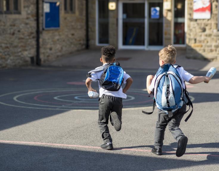 Children running to school